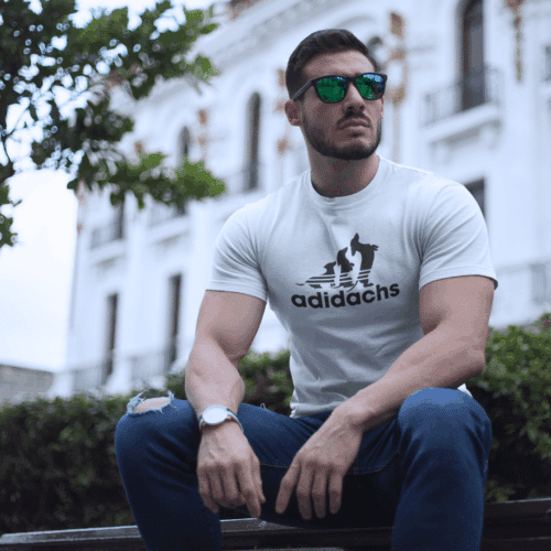 Man wearing White Adidachs T-Shirt