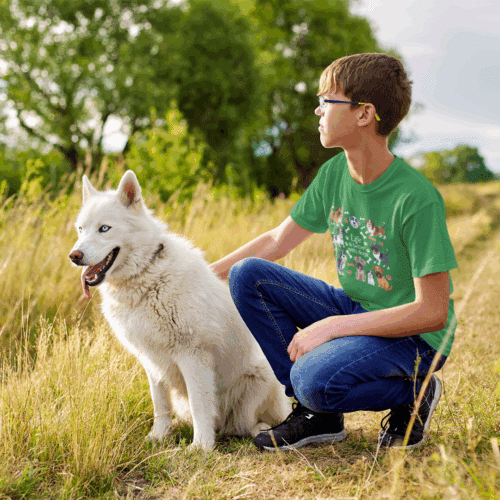 Boy Wearing Green Life is Better with Dogs Kids Tee - Dog Mom